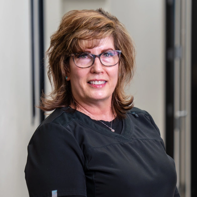 img-chris closed up portrait of Melissa working at South Mountain Family Dental in Tempe, AZ<br />