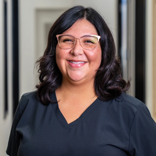 img-monica closed up portrait of Melissa working at South Mountain Family Dental in Tempe, AZ<br />